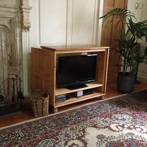 Wooden TV cabinet open